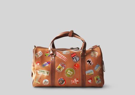 Large classic brown leather travel bagの写真素材