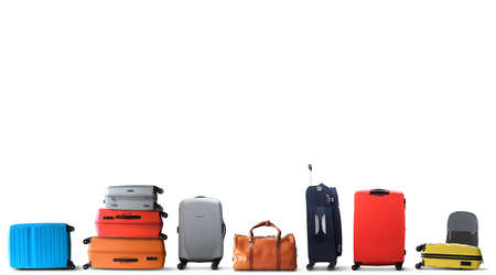 Large multicolored tourist suitcases stand in a rowの写真素材