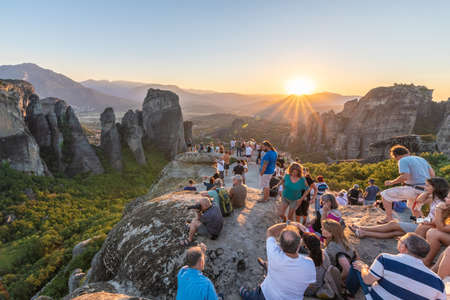Meteora, Greece - 01 September, 2017: A group of people watching sunset on Meteoraのeditorial素材