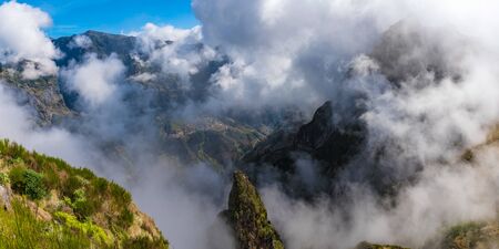 Landscape with famous mountain Pico Grande in fog, south-west of Madeira island, Portugalの写真素材