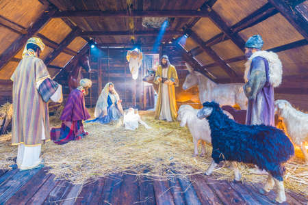 Bucharest, Romania - December 25, 2017: Christmas scene with three wise men presenting gifts to baby Jesus, Mary & Josephのeditorial素材