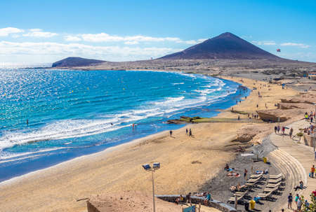 El Medano, Tenerife - 10 January, 2019: 
Landscape with El Medano beach, in background La Montana Roja, Tenerife island, Spainのeditorial素材