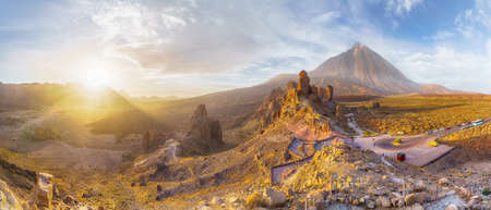 Landscape with Roques de Garcia stone and Teide mountain volcano at sunset in the Teide National Park, Tenerife, Canary Islands, Spain.の写真素材