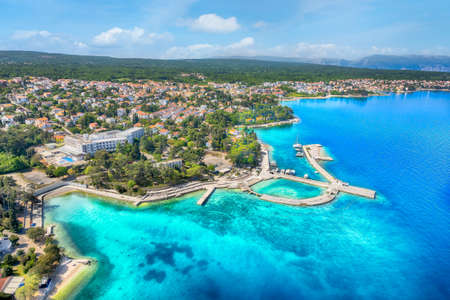 Aerial view with Malinska town and beach, Krk island, Croatia
