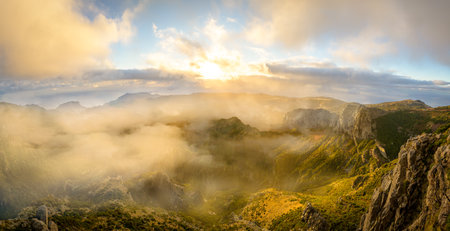 Top of the mountain at sunrise on Pico do Arieiro, Madeira islands, Portugalの写真素材