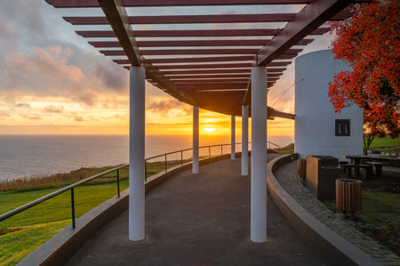 Sunset at Miradouro do Caminho Novo in SÃ£o Miguel, Azores.の写真素材