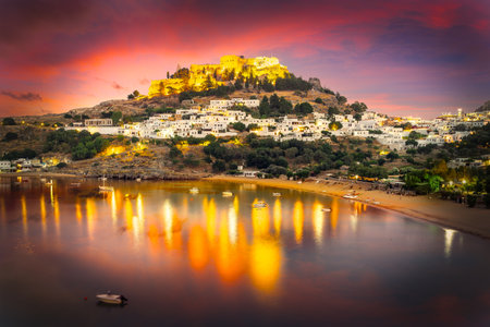 Evening view of Lindos, Acropolis in the background, Rhodes, Greeceの写真素材