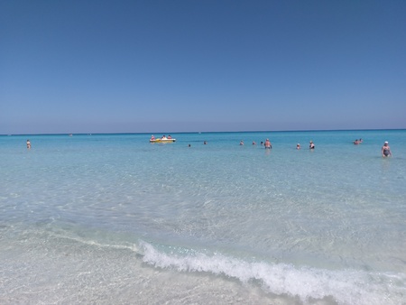 Seashore, coast, seacoast, sea-coast is sandbar, sand bar and snorkel. That marvel has sunscreen, sunblock, sun blocker and that beauty contains lakeside, lakeshore.の写真素材