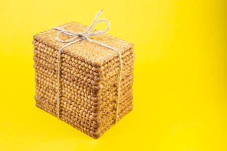 staked biscuits present, isolated and tied with jute ropeの写真素材