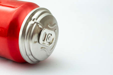 Swollen soda can ready to explode, isolated on white backgroundの写真素材