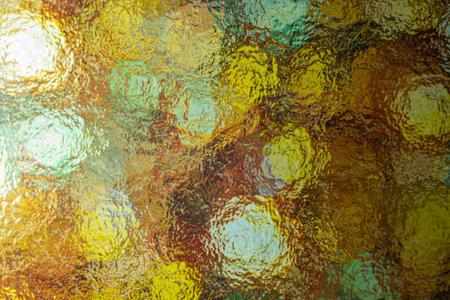 warm colors seen thru textured glass, abstract babckdropの写真素材