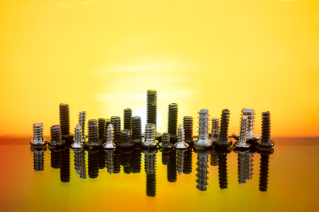 city at sunrise, made by tiny screws, creative conceptの写真素材