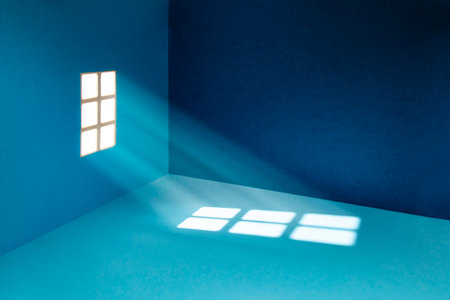 Blue room made from cardboard, with a rectangular window, and sun rays projecting on the floorの写真素材