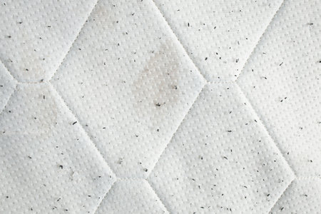 Used mattress close up background with stains