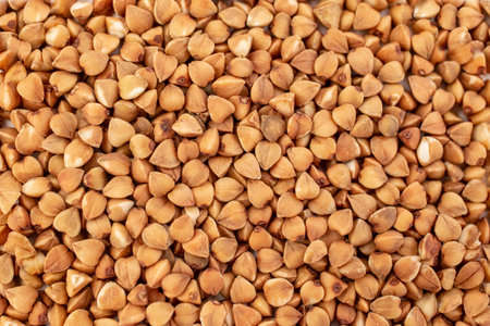 Buckwheat seeds full frame texture, healthy food backdrop, close upの写真素材