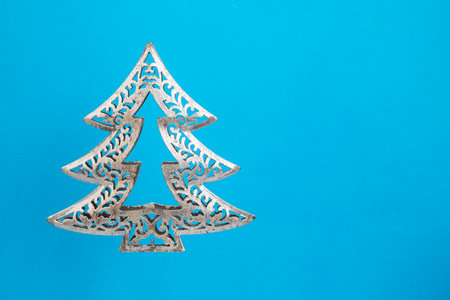 Silver metallic fir tree structure on blue paper background, abstract  backdropの写真素材