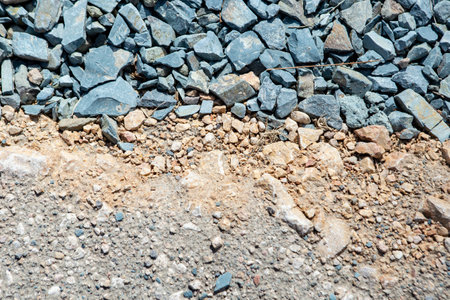 Granite chippings layer texture for road asphalting preparation