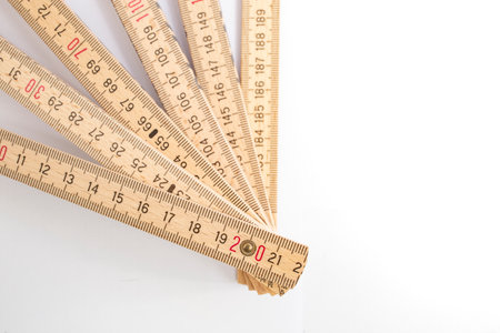 Abstract backdrop with a arranged  wooden measuring meter, close up