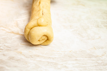 Yellow raw dough roll, soft focus close up abstractの写真素材