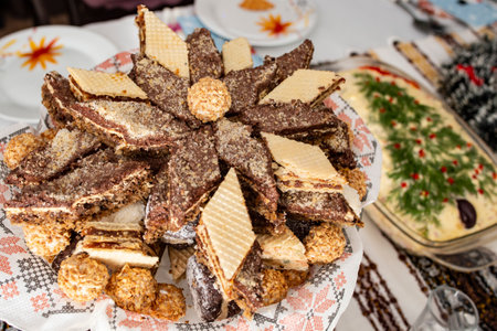 Baked diamond shaped cookies stacked and served on christmas dinner table  close upの写真素材