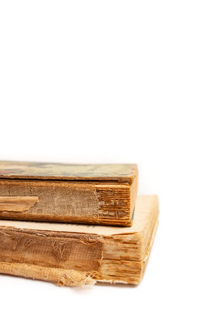 two obsolete books stacked isolated on white background, abstract   backdropの写真素材