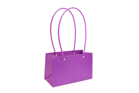 Plastic purple present bag isolated on white background, empty backdrop for productの写真素材