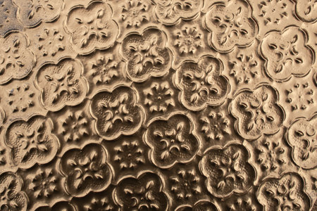 Floral pattern painted with golden  colored spray, abstract   backdropの写真素材