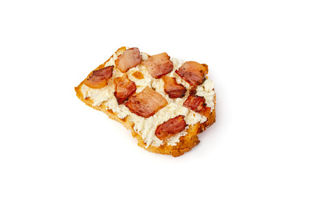 Toasted bread slice with cottage cheese and chopped fried bacon , isolated on white backgroundの写真素材
