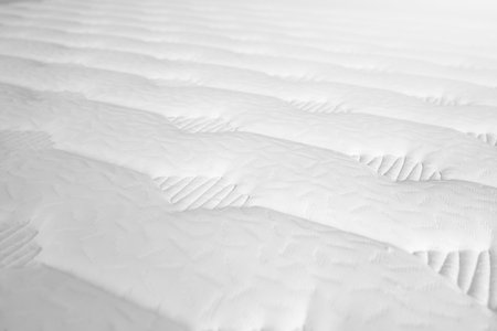 White mattress texture , new fabric pattern side view perspective close upの写真素材