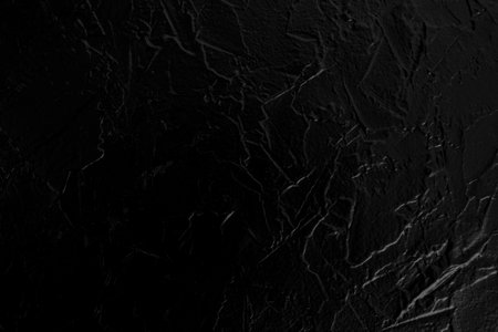 Glossy plaster stucco , black color granite structure  backdropの写真素材