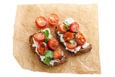 Italian bruschetta with tomatoes isolated on white background