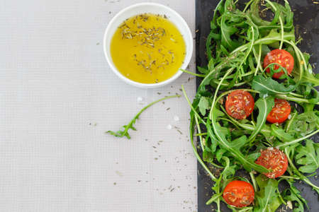 salad with avocado, ripe tomato and fresh herbs