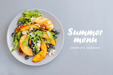 fruit salad with peaches for summer menuの写真素材