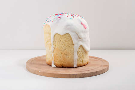 Easter cakes with icing and topping on the table