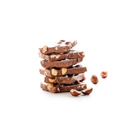 Chocolate pieces isolated on white backgroundの写真素材