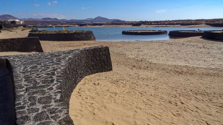 La Santa Sport is a nice place on Lanzarote island where a lot of teams have practices. Beautiful beach, wild black sand, no waves, good nature around.の写真素材