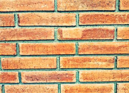 Orange brick wall background texturedの写真素材