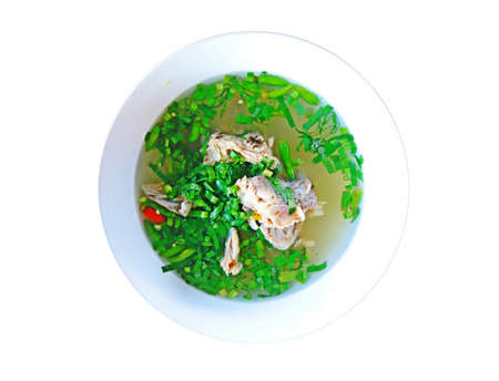 Hot and spicy hot pork ribs with fresh chili and coriander on white background isolation image top viewの写真素材