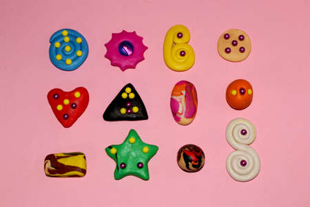 various shapes on a pink background with ornamentsの写真素材