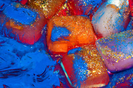 the concept of an icy ice cube with many different colors, colorfulの写真素材