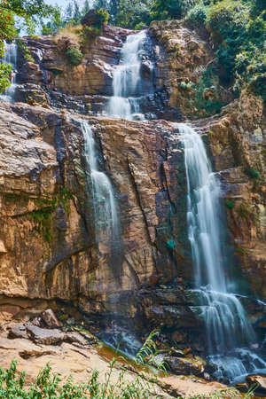 Waterfall in the mountains jungle summer tropics.の写真素材