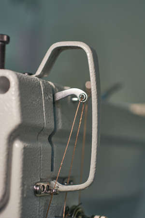 Sewing machine for watering heavy materials