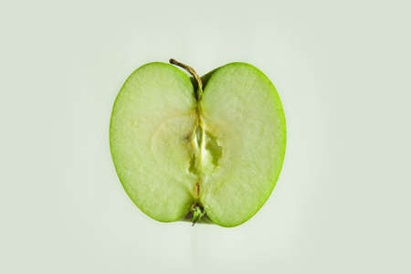 Half of apple isolated on the white background