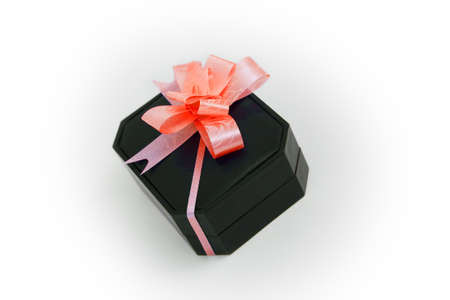 Black gift box with red ribbon 