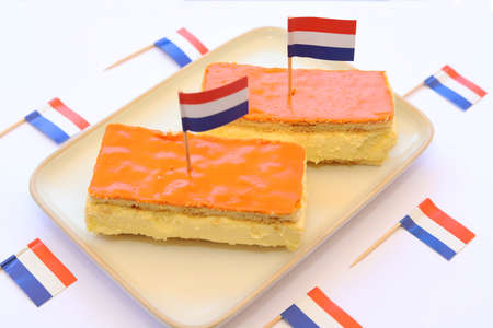 Orange tompouce. Traditional Dutch pastry to celebrate King's Day in the Netherlands.