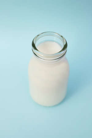 Fresh milk in a glass bottleの写真素材
