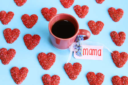 Cup of coffee and chocolate hearts. Happy Mother's Day concept.の写真素材