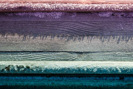 abstract background of wooden table covered with snowの写真素材