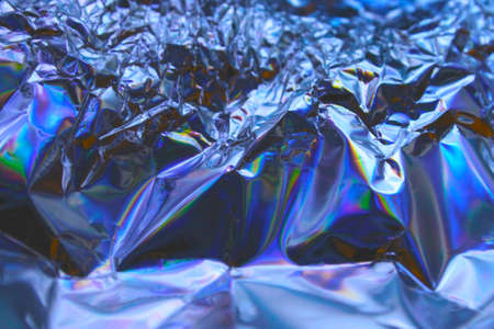 Holographic iridescent foil texture background. It can be used for posters, cards, flyers, brochures, magazines and any kind of cover. eps 10の写真素材