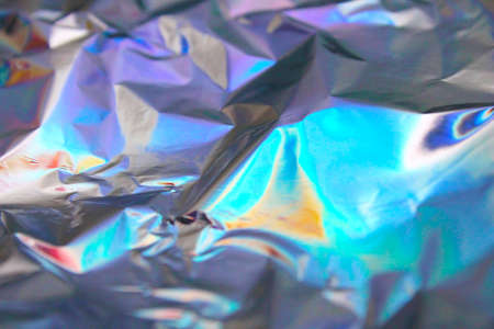 Holographic iridescent foil texture background. It can be used for posters, cards, flyers, brochures, magazines and any kind of cover. eps 10の写真素材